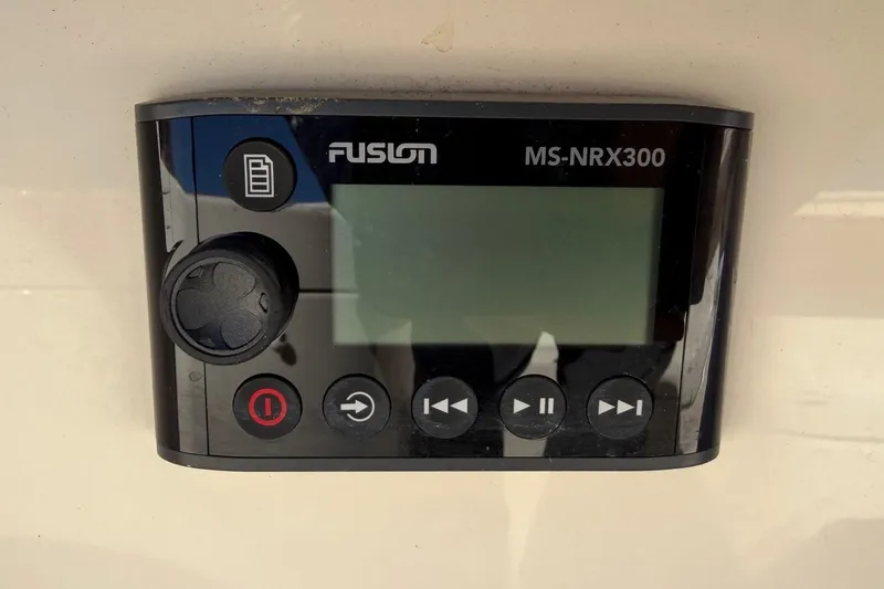 Slide: The Image of Fusion MS-NRX300 marine stereo controller on 2021 Scout 355 LXF boat. - 71