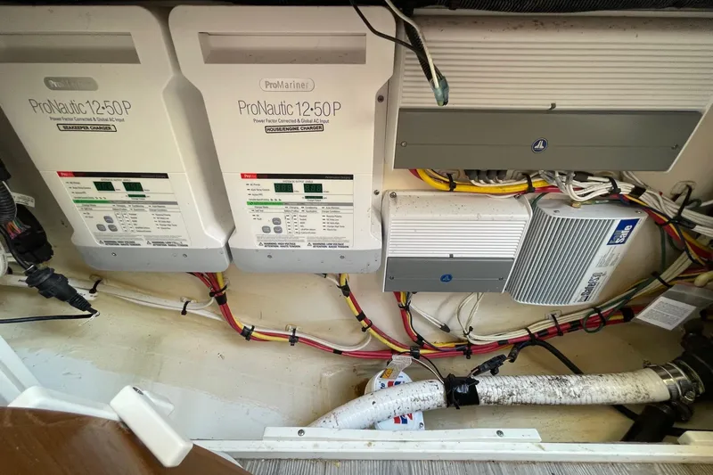 Slide: The Image of Electrical system of a 2021 Scout 355 LXF boat, featuring ProNautic chargers. - 74