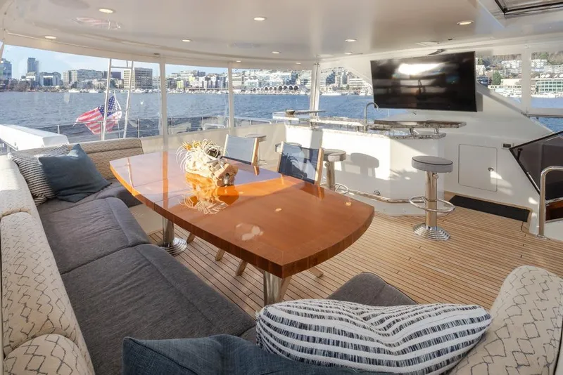 Slide: The Image of Luxurious 2014 Ocean Alexander 85 Cockpit Motoryacht interior with elegant seating and waterfront view. - 29