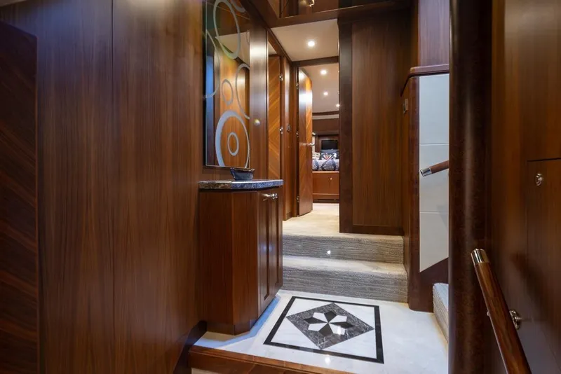 Slide: The Image of Luxurious interior of 2014 Ocean Alexander 85 Cockpit Motoryacht with elegant wood paneling. - 31