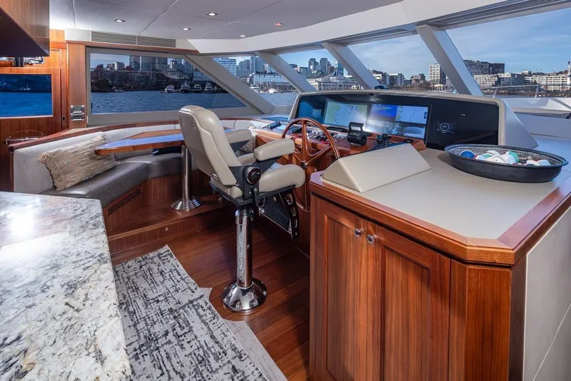 Slide: The Image of Luxurious helm of 2014 Ocean Alexander 85 Cockpit Motoryacht with city skyline view. - 36