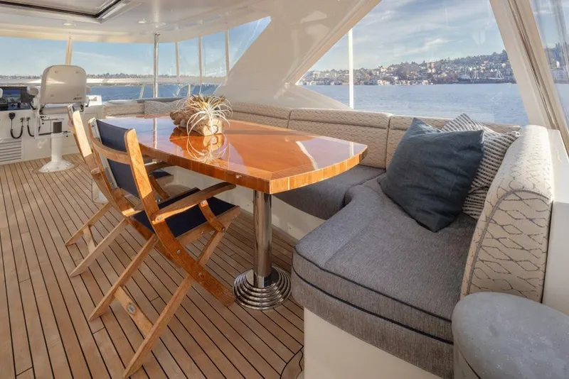 Slide: The Image of Luxurious 2014 Ocean Alexander 85 Cockpit Motoryacht interior with elegant seating and scenic views. - 42