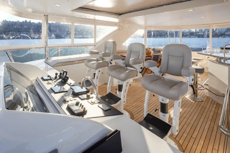 Slide: The Image of Luxurious helm station on 2014 Ocean Alexander 85 Cockpit Motoryacht with panoramic views. - 43