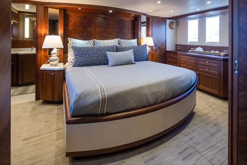 Slide: The Image of Luxurious bedroom in 2014 Ocean Alexander 85 Cockpit Motoryacht with elegant wood finishes. - 45