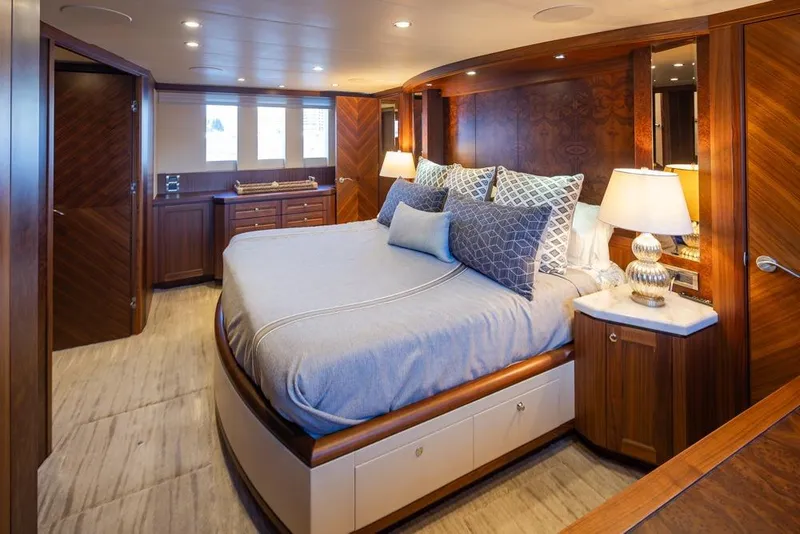 Slide: The Image of Luxurious bedroom in 2014 Ocean Alexander 85 Cockpit Motoryacht with elegant wood finishes. - 46