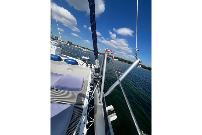 Slide: The Image of Fountaine Pajot Belize 43 catamaran deck view, 2000 model, sailing on a sunny day. - 17