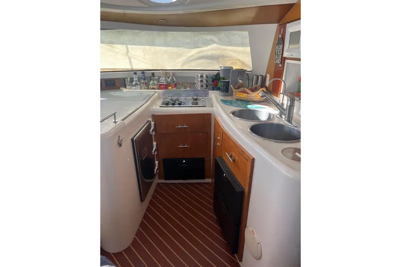 Slide: The Image of Interior of 2000 Fountaine Pajot Belize 43 yacht kitchen with modern amenities. - 30