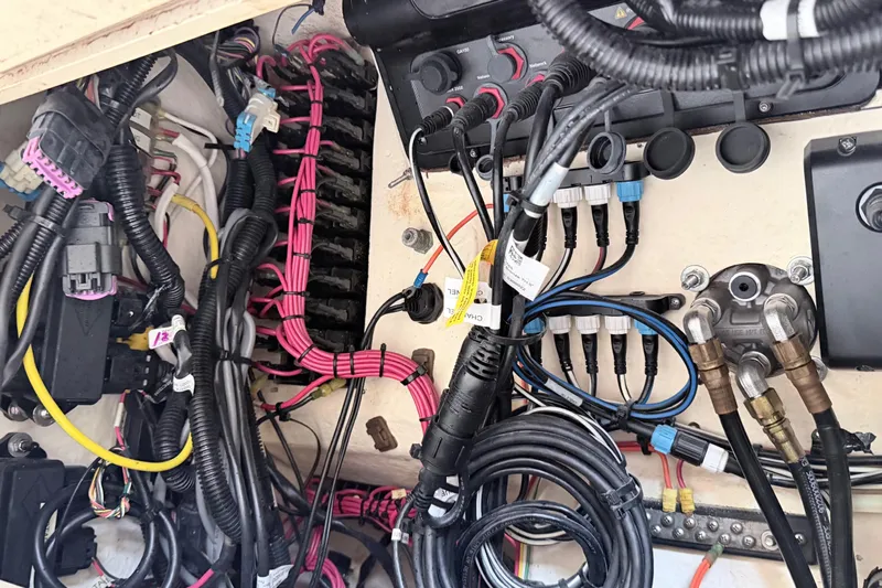 Slide: The Image of Interior of 2001 Parker 2520 Deep Vee Sport Cabin boat with steering wheel and seats. - 10