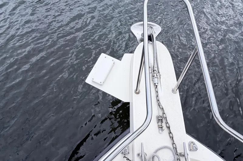 Slide: The Image of 2001 Parker 2520 Deep Vee Sport Cabin boat deck with ocean view. - 13