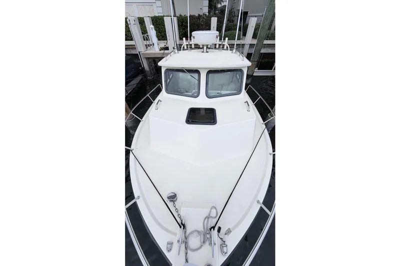 Slide: The Image of Wiring and electronics inside a 2001 Parker 2520 Deep Vee Sport Cabin boat. - 16