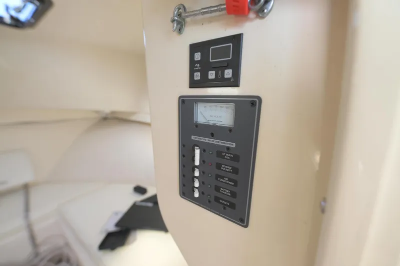 Slide: The Image of AC Power panel with Dometic 12,000BTU Air conditioner - 18