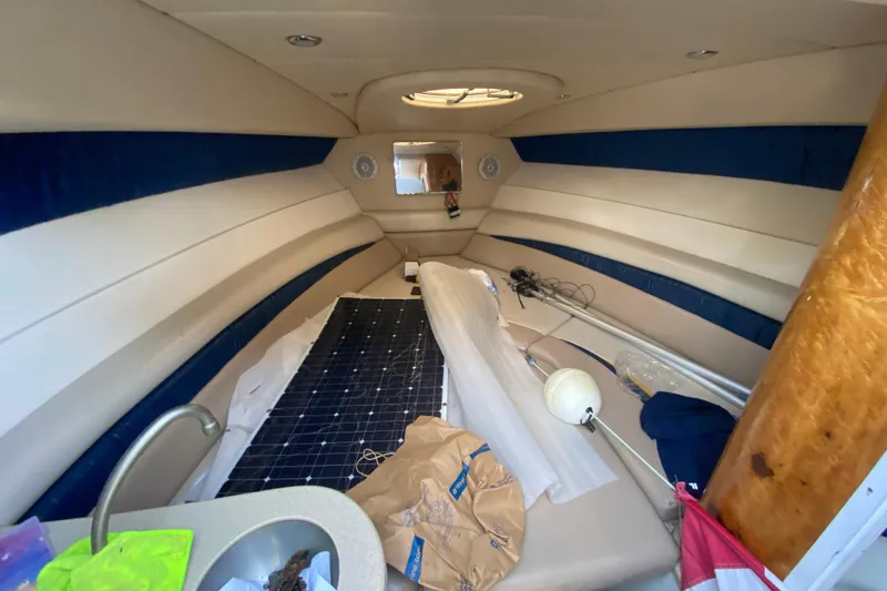 Slide: The Image of Interior cabin of 2004 Deep Impact 36 DI boat with seating and equipment. - 25