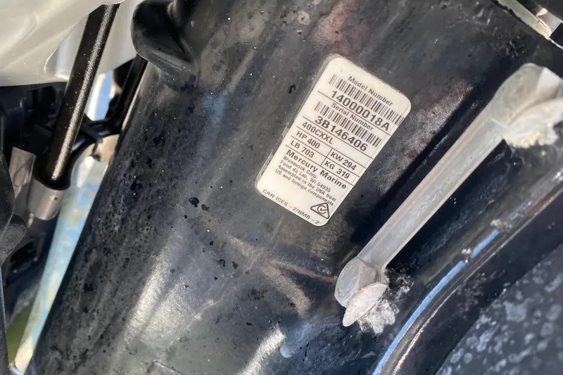 Slide: The Image of Label on a 2004 Deep Impact 36 DI boat engine, showing model and serial numbers. - 29