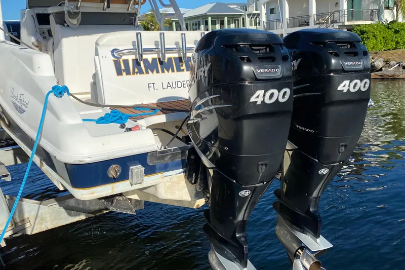 Slide: The Image of 2004 Deep Impact 36 DI boat with twin Mercury Verado 400 engines, docked in Ft. Lauderdale. - 33
