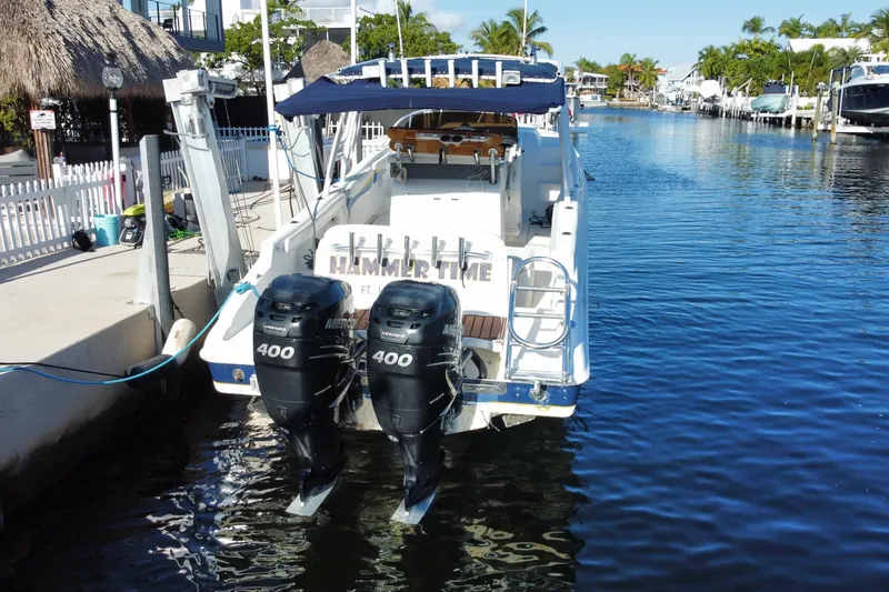 Slide: The Image of 2004 Deep Impact 36 DI boat docked with dual Mercury 400 engines. - 36
