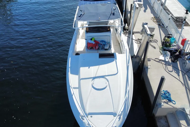 Slide: The Image of Aerial view of 2004 Deep Impact 36 DI boat docked at marina. - 8