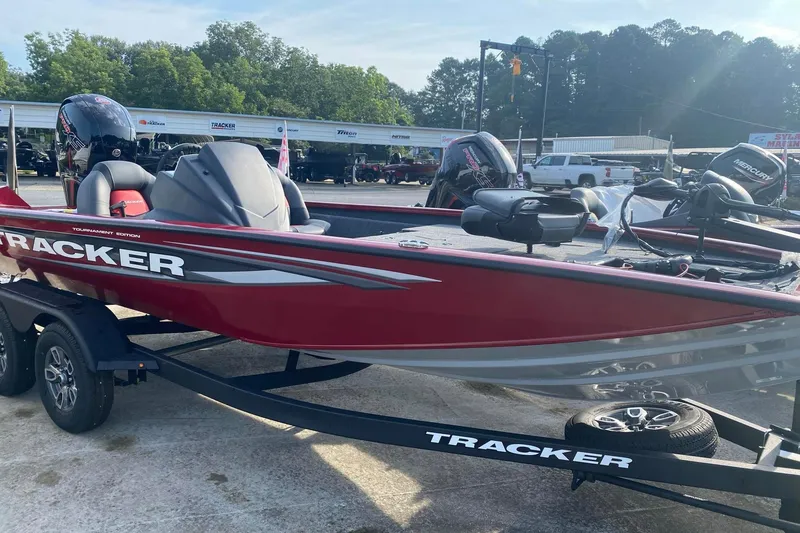 The Image of 2025 Tracker Pro Team 195 Tournament Edition boat in vibrant red on trailer. - 0
