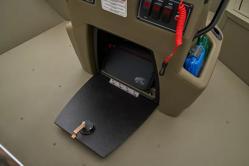 Slide: The Image of Manufacturer Provided Image: 2025 Tracker Grizzly 2072 CC Sportsman boat console with storage compartment and control panel. - 25