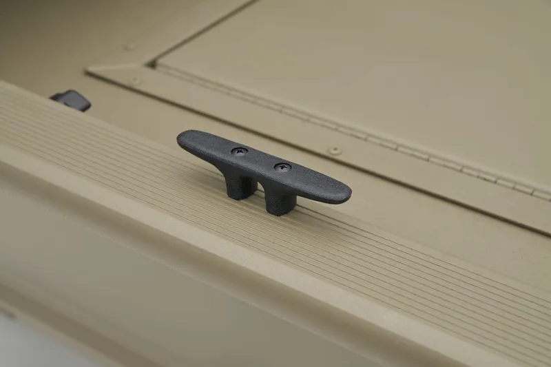 Slide: The Image of Manufacturer Provided Image: 2025 Tracker Grizzly 2072 CC Sportsman boat cleat on textured deck surface. - 39