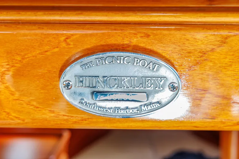 Slide: The Image of Hinckley Picnic Boat EP 2003 nameplate on polished wood, Southwest Harbor, Maine. - 45