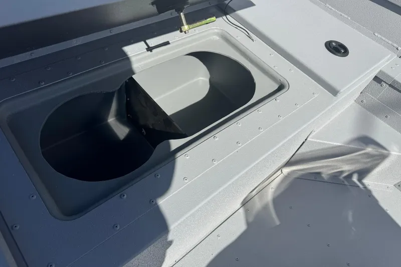 Slide: The Image of G3 Bay 17 boat interior detail, 2026 model, featuring a dual compartment storage area. - 8