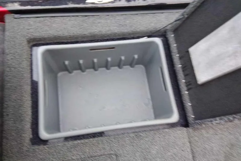 Slide: The Image of Open storage compartment in 2026 Nitro Z20 XL Pro boat. - 124