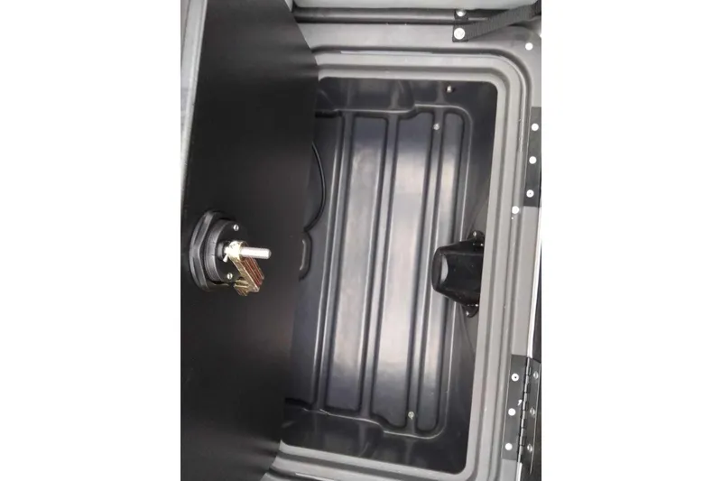 Slide: The Image of Storage compartment of 2026 Sun Tracker Party Barge 22 XP3 with key lock mechanism. - 91