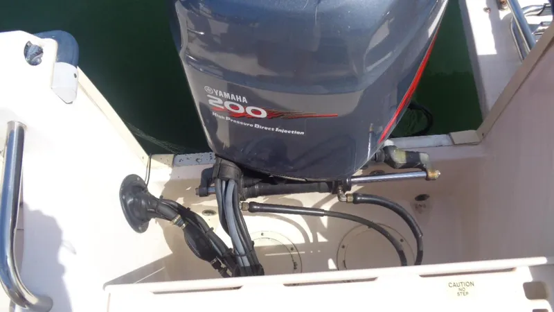 Slide: The Image of Yamaha 200 HP outboard motor on 2001 Grady-White Escape 209. - 11