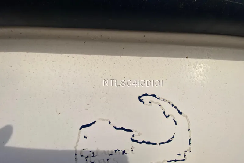 Slide: The Image of 2001 Grady-White Escape 209 boat hull with visible serial number. - 13