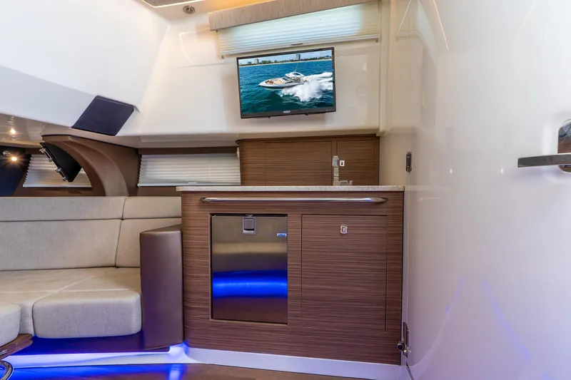 Slide: The Image of Luxurious interior of 2024 Boston Whaler 420 Outrage with modern amenities and sleek design. - 52