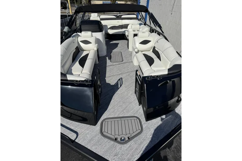 Slide: The Image of 2026 JC 24 SportToon TT pontoon boat with luxurious seating and modern design. - 12