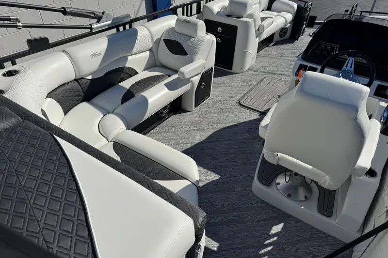 Slide: The Image of Luxurious interior of 2026 JC 24 SportToon TT pontoon boat with plush seating. - 19