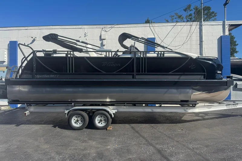 The Image of 2026 JC 24 SportToon TT pontoon boat on trailer, parked outdoors. - 7
