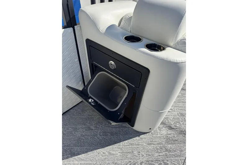 Slide: The Image of 2026 JC 24 SportToon TT boat seat with built-in cup holders and storage compartment. - 15