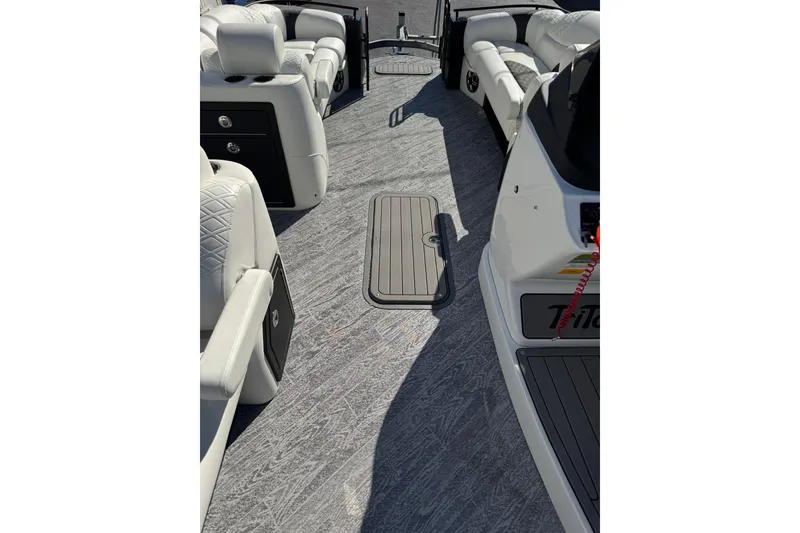 Slide: The Image of Interior view of 2026 JC 24 SportToon TT pontoon boat with luxurious seating. - 21