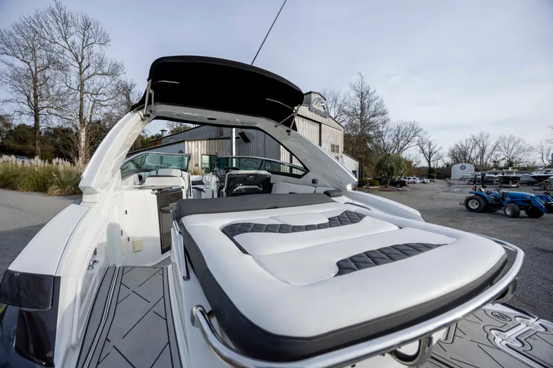 Slide: The Image of 2015 Monterey 328SS Super Sport boat interior with sleek seating and modern design. - 18