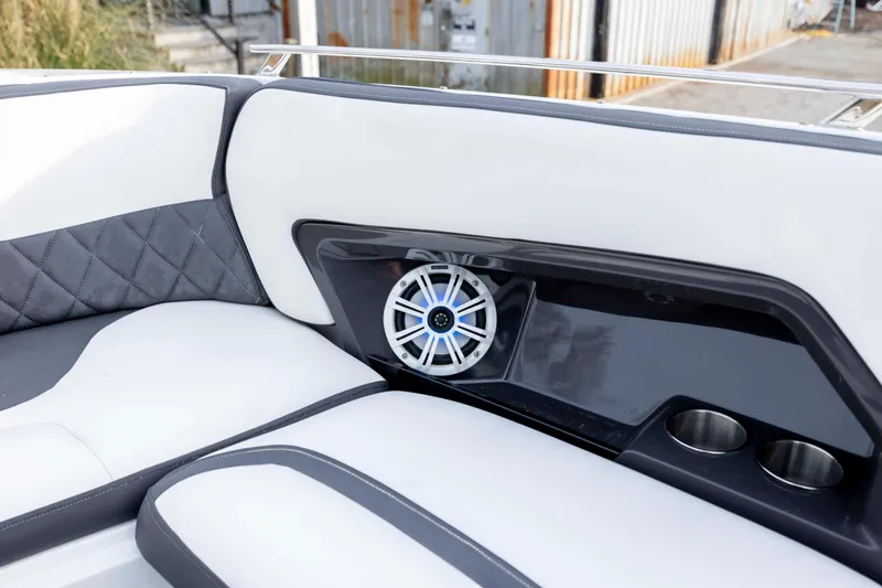 Slide: The Image of Engine compartment of a 2015 Monterey 328SS Super Sport boat, showcasing dual engines. - 32