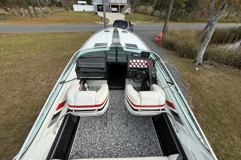 Slide: The Image of 1988 Thunderbird Formula 311 SR1 boat interior with dual seats and control panel. - 15