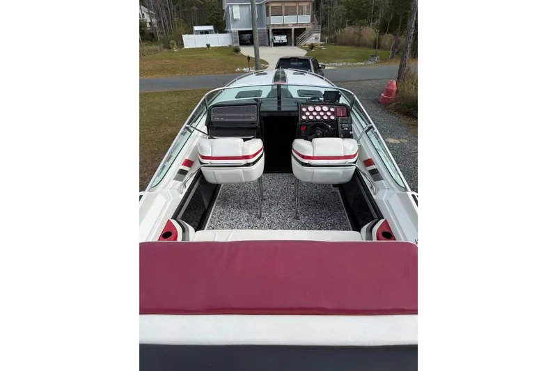 Slide: The Image of 1988 Thunderbird Formula 311 SR1 boat interior with dual seats and control panel. - 19