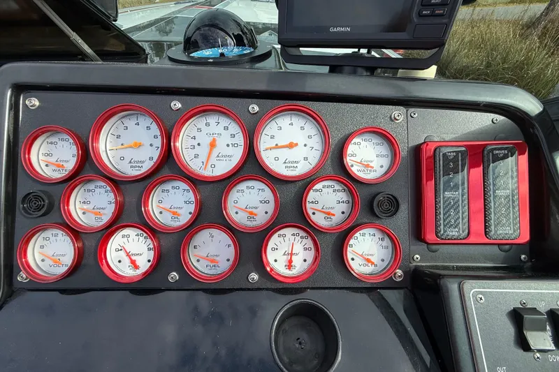 Slide: The Image of Dashboard of a 1988 Thunderbird Formula 311 SR1 with Livorsi gauges and Garmin device. - 24