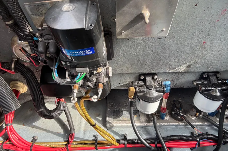 Slide: The Image of Engine compartment of 1988 Thunderbird Formula 311 SR1 with Kiekhaefer Aeromarine components. - 33