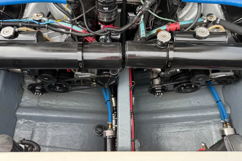 Slide: The Image of Engine compartment of a 1988 Thunderbird Formula 311 SR1 with visible components and wiring. - 38