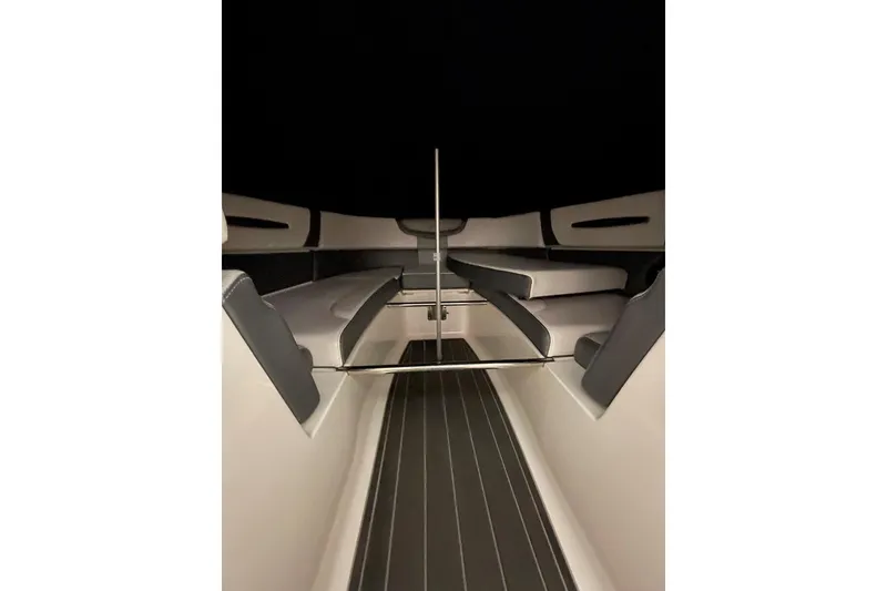 Slide: The Image of Interior view of 2018 Chaparral 287 SSX boat, featuring sleek seating and modern design. - 15