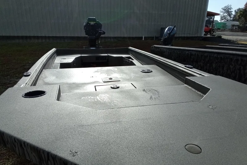 Slide: The Image of 2026 Thor 1754 Swamp Hammer boat, sleek design, outdoor setting. - 13