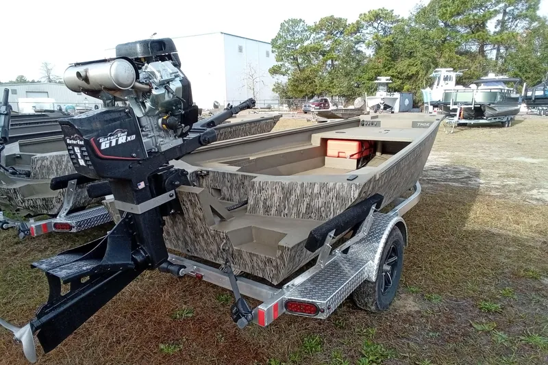 Slide: The Image of 2026 Thor 1754 Swamp Hammer boat with powerful motor on a trailer. - 4