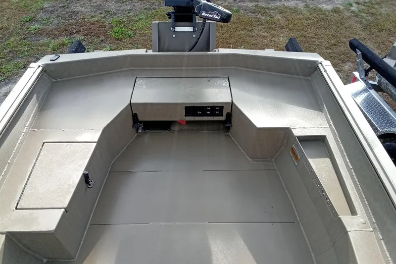 Slide: The Image of 2026 Thor 1754 Swamp Hammer boat interior with storage compartments and control panel. - 6