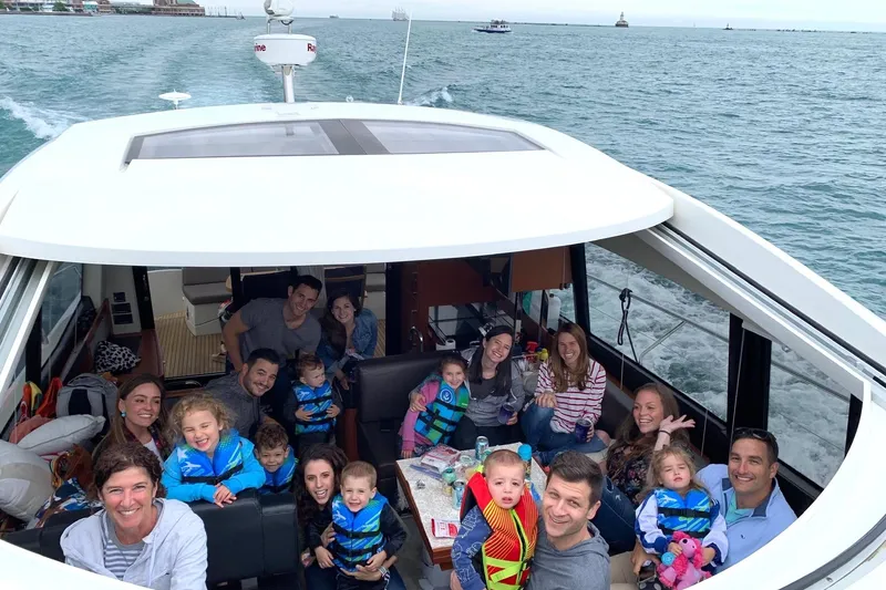 Slide: The Image of Group enjoying a boat trip on a 2017 Prestige 500S yacht. - 11