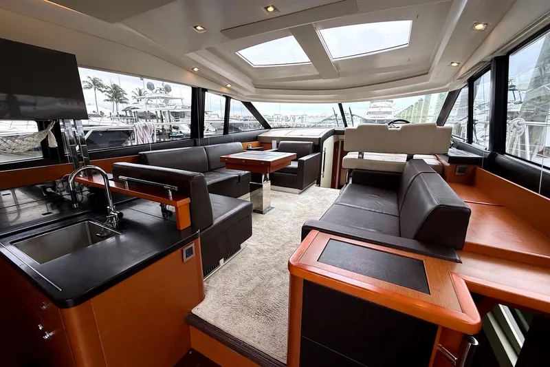 Slide: The Image of Luxurious interior of a 2017 Prestige 500S yacht with modern seating and sleek design. - 15