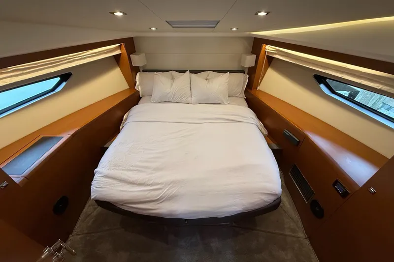 Slide: The Image of Luxurious bedroom interior of 2017 Prestige 500S yacht with cozy bedding and modern design. - 21
