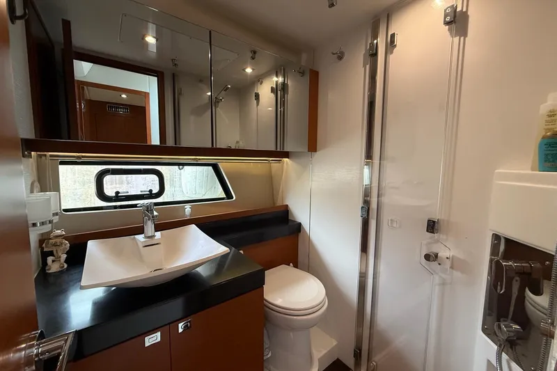 Slide: The Image of Luxurious bathroom in 2017 Prestige 500S yacht with modern fixtures and elegant design. - 23